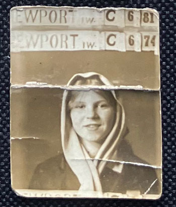 Portrait of a girl - with two header signs on the same print.